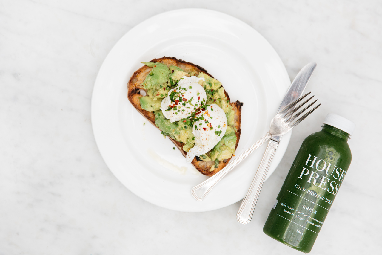 Egg and avocado on sourdough with a green juice